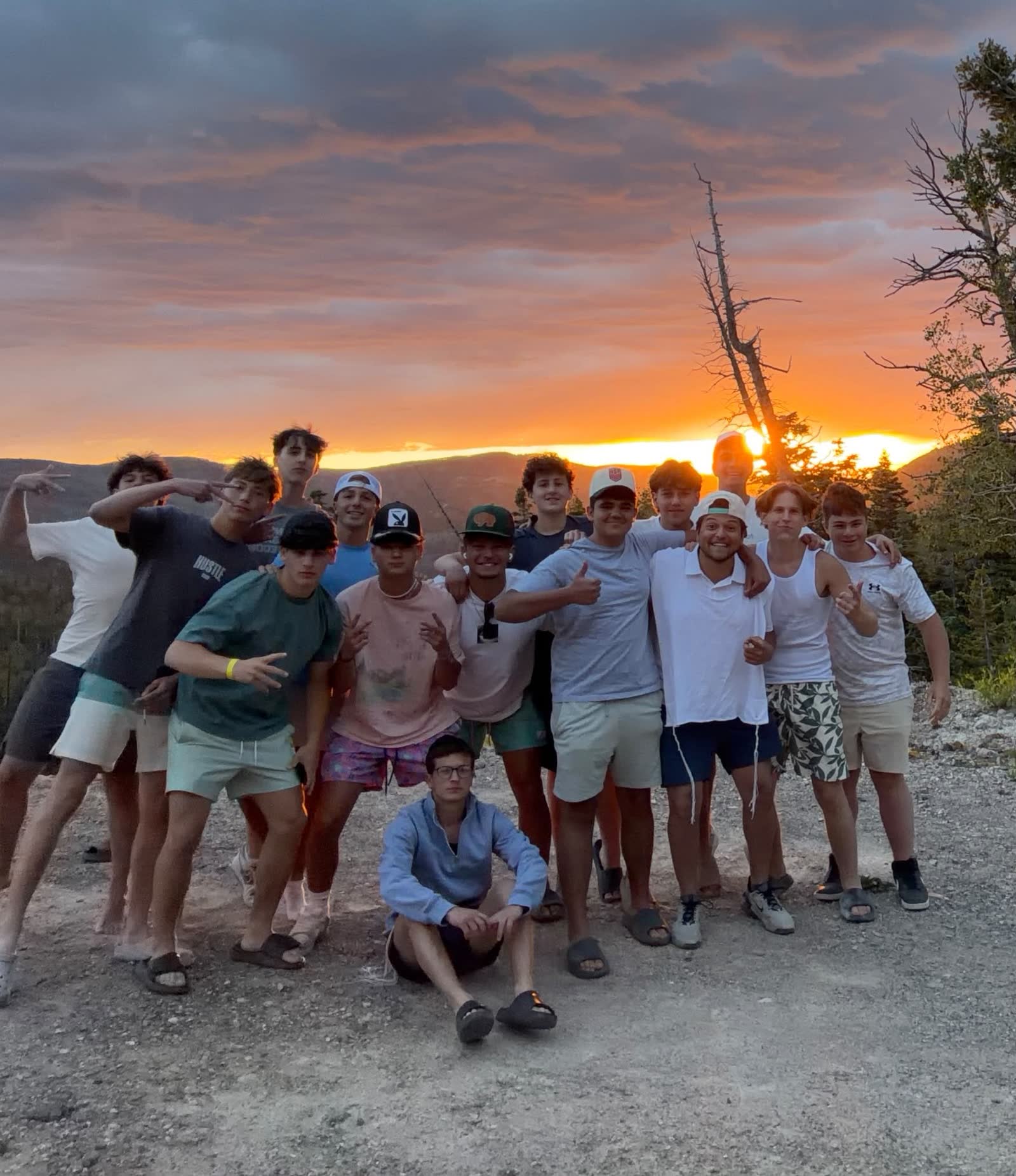 Camp Shepsala group at a mountain overlook during sunset